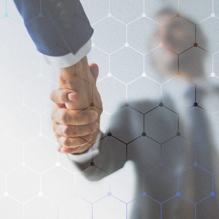 Corporate business handshake between partners representing strong collaboration and trust at Supertech Computer.